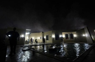A2m7ElCCYAArQVj Benghazi youth said to be cleaning the US consulate in the aftermath of the attack (Photo: via @EmadDlala)