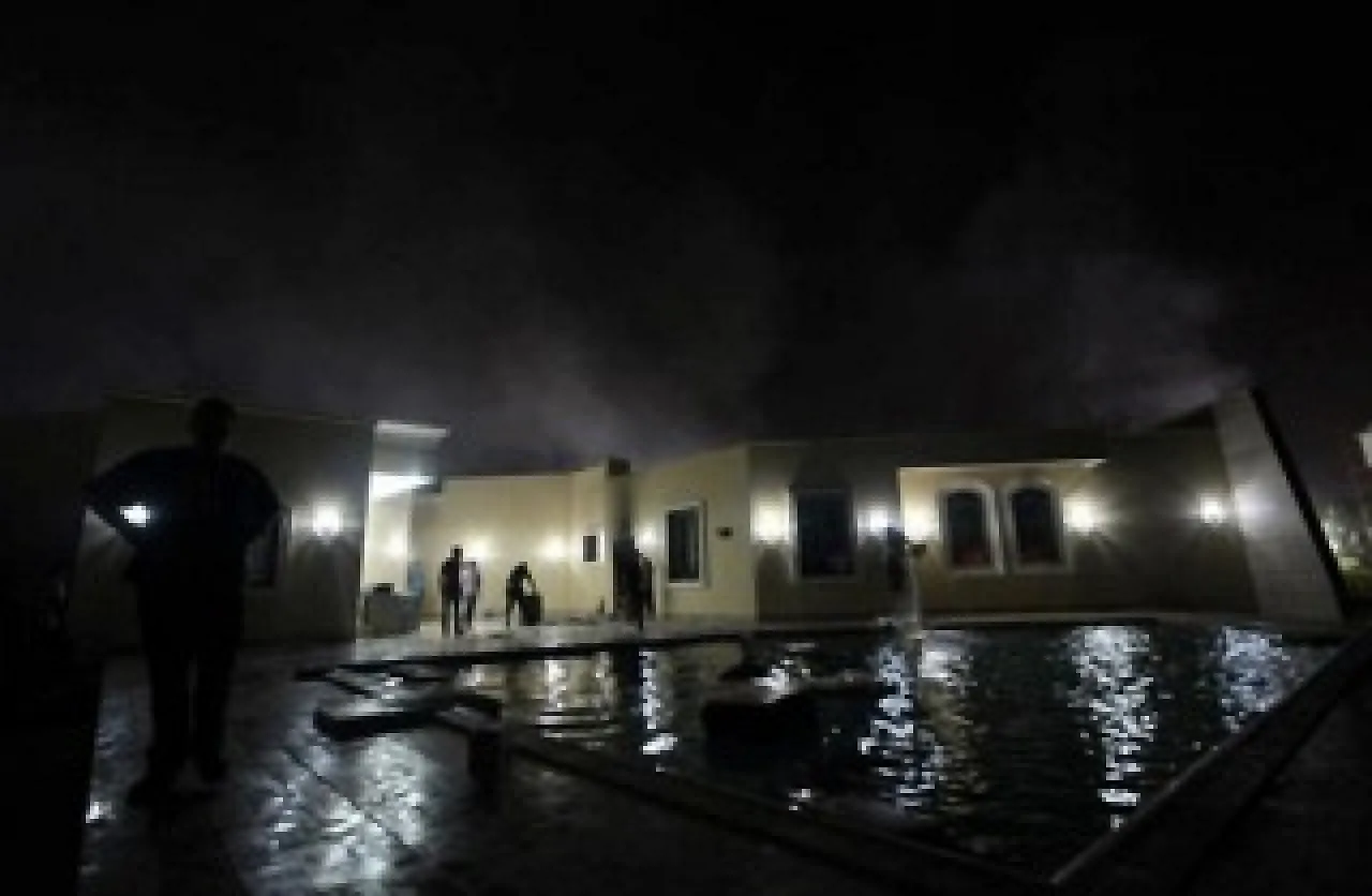 Benghazi youth said to be cleaning the US consulate in the aftermath of the attack (Photo: via @EmadDlala)