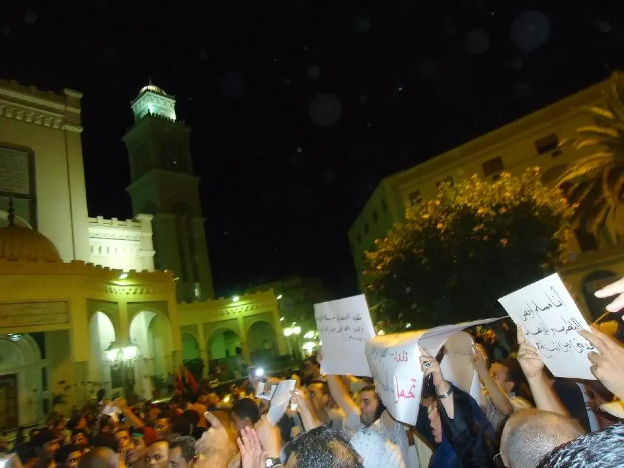 Demonstrators gather in Tripoli's Algeria Square to express their solidarity with the United States.