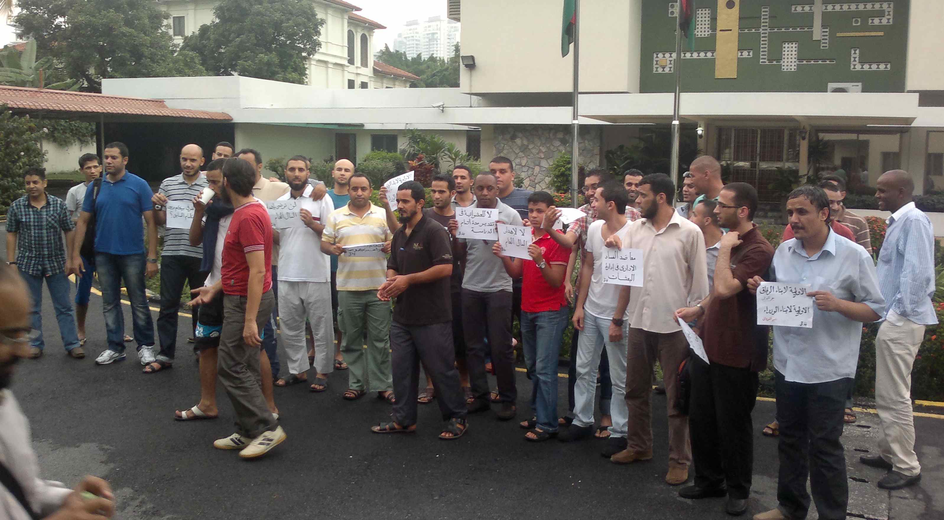 KL students Desperate post-graduate students outside the Kuala Lumpur embassy