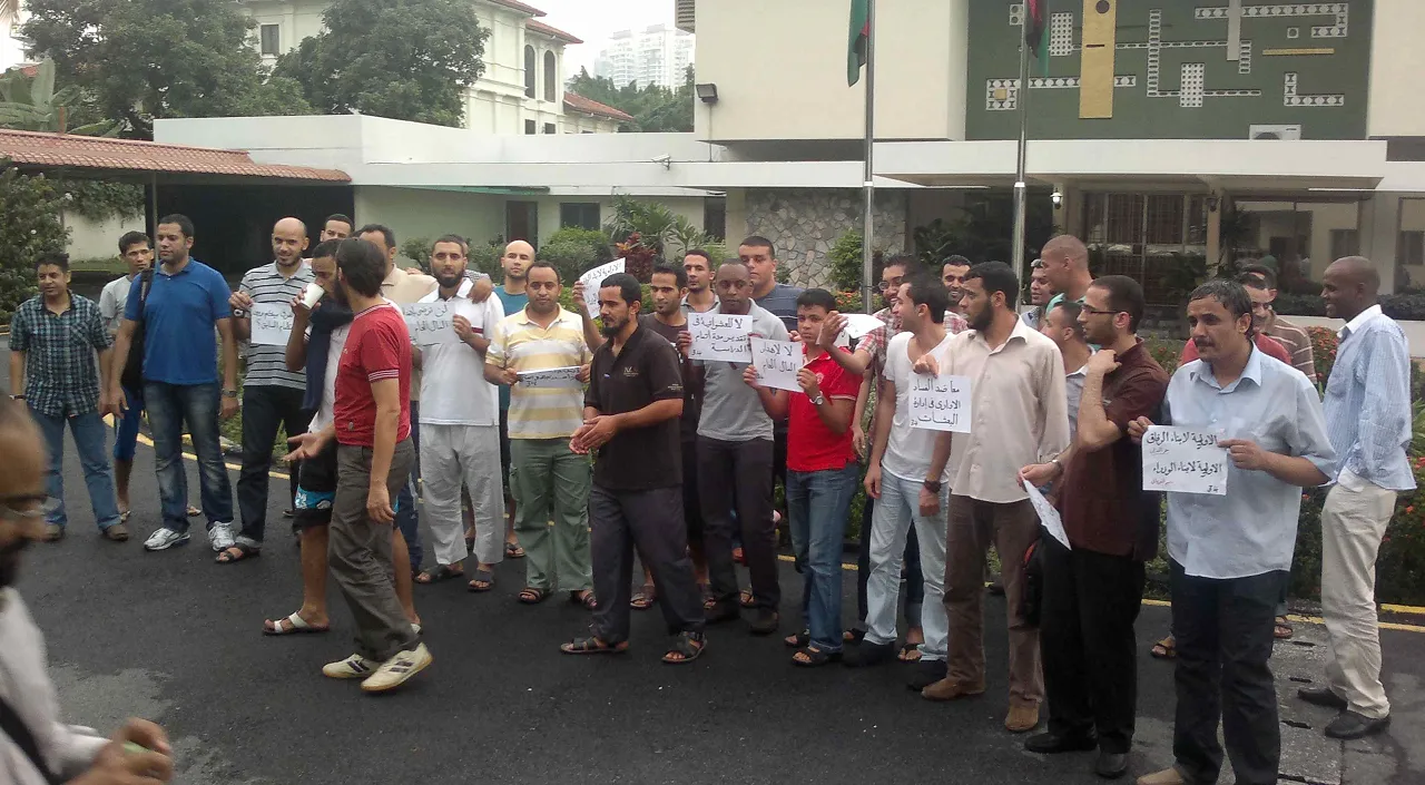 KL students Desperate post-graduate students outside the Kuala Lumpur embassy