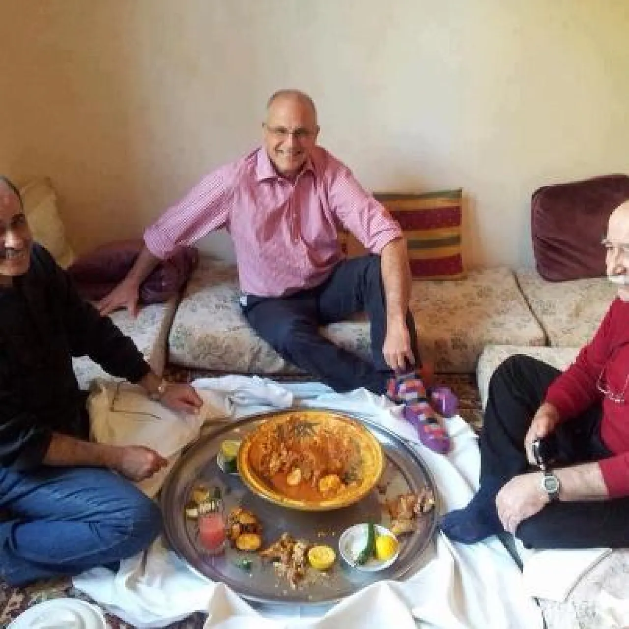 British ambassador Michael Aron bazeen-17th-190213 British Ambassador Michael Aron photographed eating Bazeen with Belgassem Muntaser (right) and Dr Sulieman Khoja (left) (Photo: Facebook).
