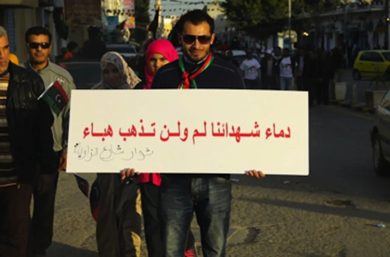 Tajoura march "The Blood of the Martyrs will not go in vain" reads one marcher's banner