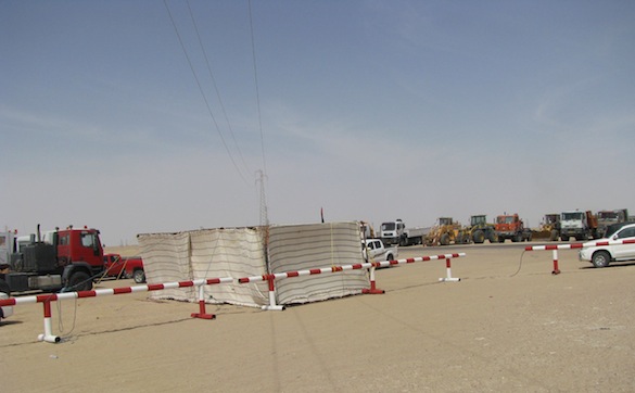 Gialo 6 Protestors vehicles at the entrance to Gialo 59 oilfield
