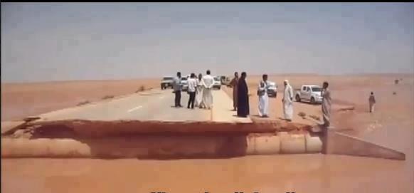 Rains wash away road to Sebha