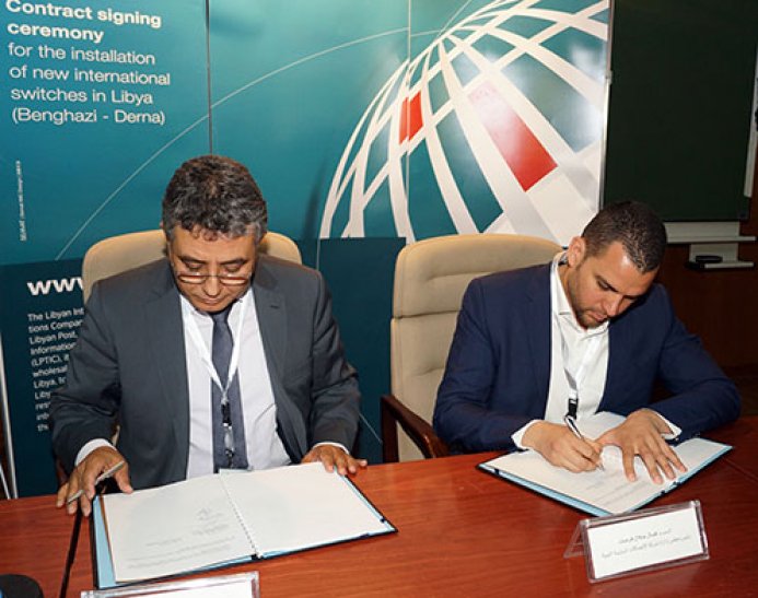 Against the tide, Libya's telecoms paddle on