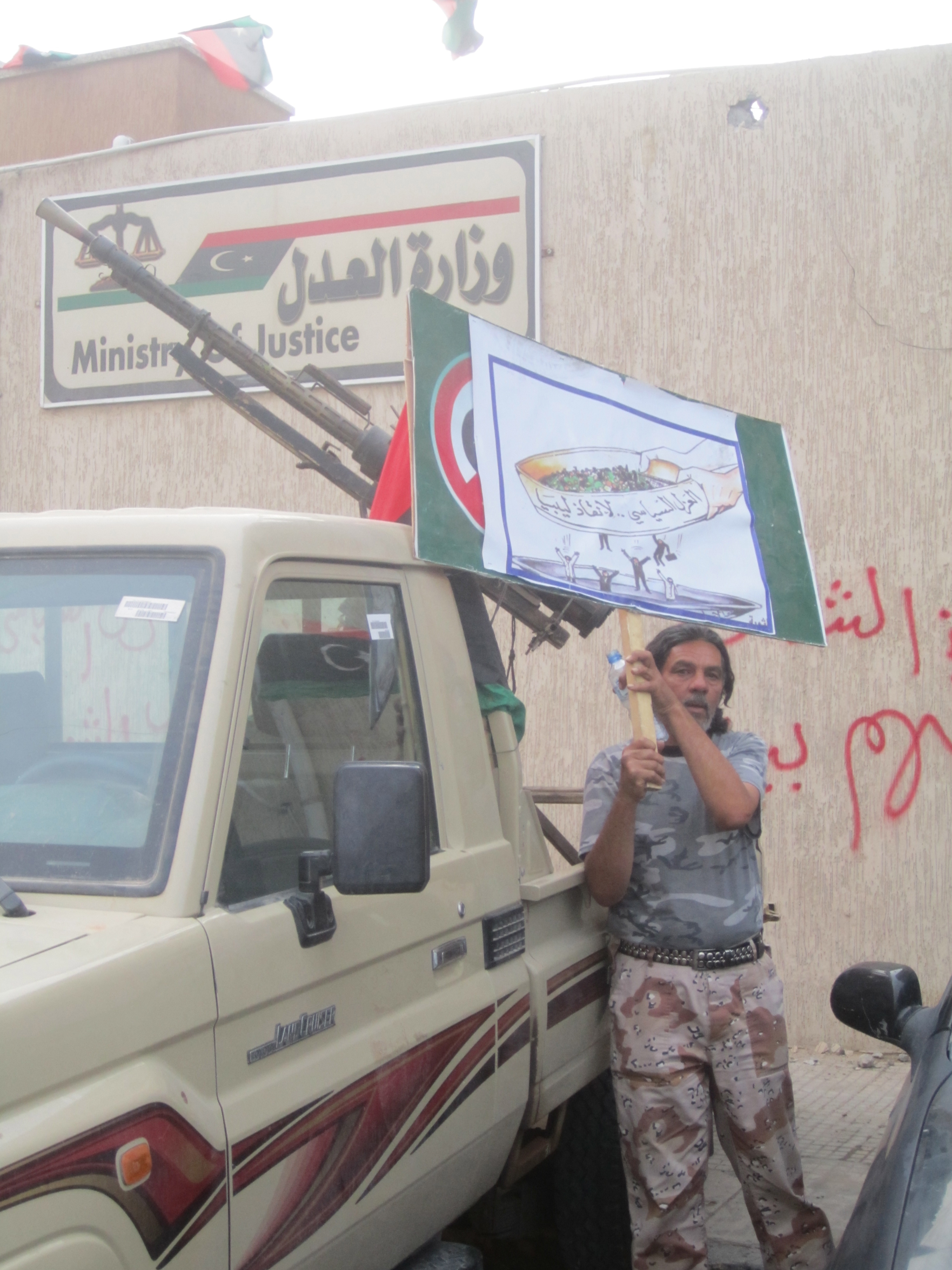 "We won’t use these weapons": militiamen at Justice Ministry siege