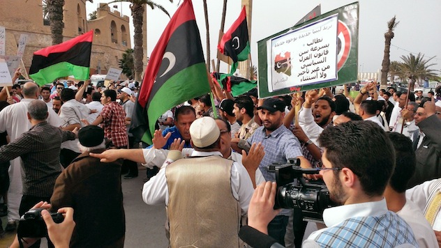 Sparks fly in Tripoli standoff between militia opponents and supporters