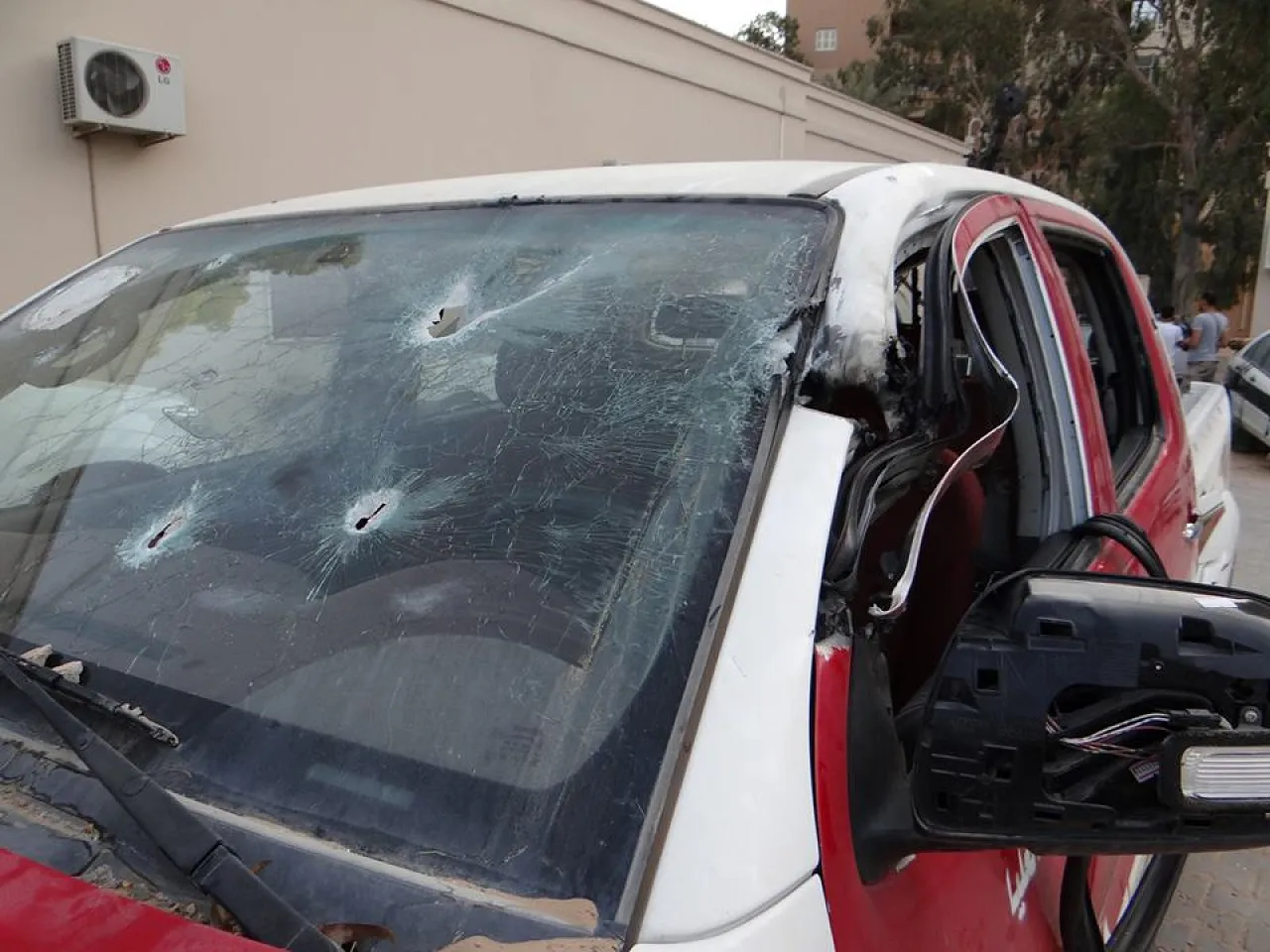 PoliceCardamaged Police car damaged in the clash (Photo: PFG Facebook)