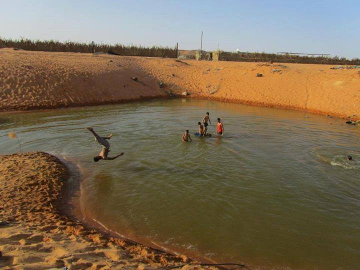 Locals turn disused Kufra sand quarry into swimming pool