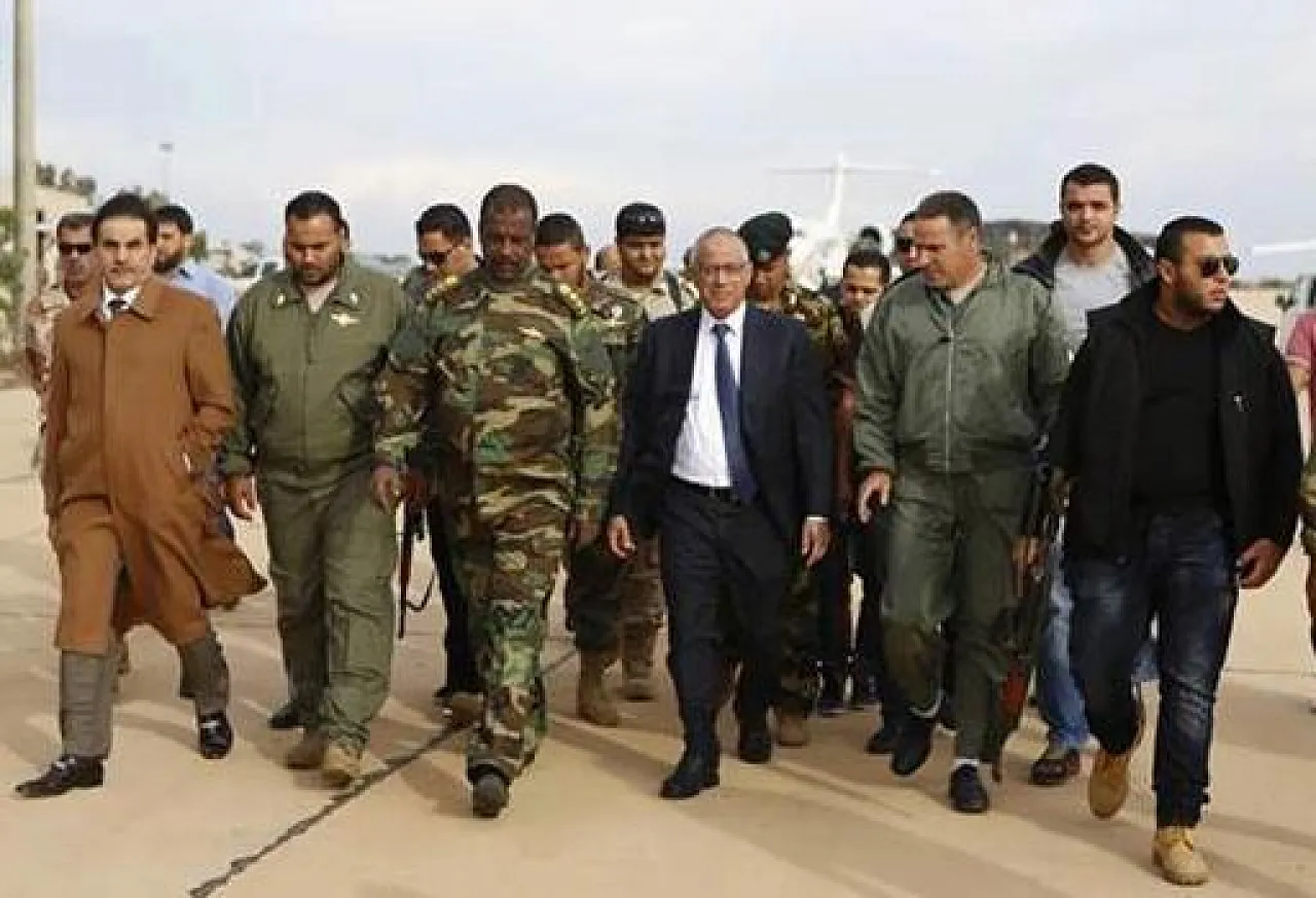 Prime Minister Ali Zeidan with Commander of Benghazi Special Forces, Wanis Bukhamada, (left) and Colonel Abd Nasser Bousnina (right) (Photo: Government's official Facebook page)