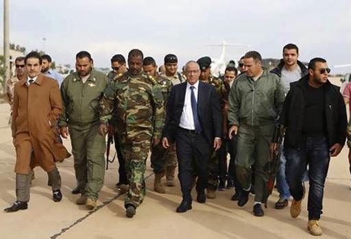 Prime Minister Ali Zeidan with Commander of Benghazi Special Forces, Wanis Bukhamada, (left) and Colonel Abd Nasser Bousnina (right) (Photo: Government's official Facebook page)
