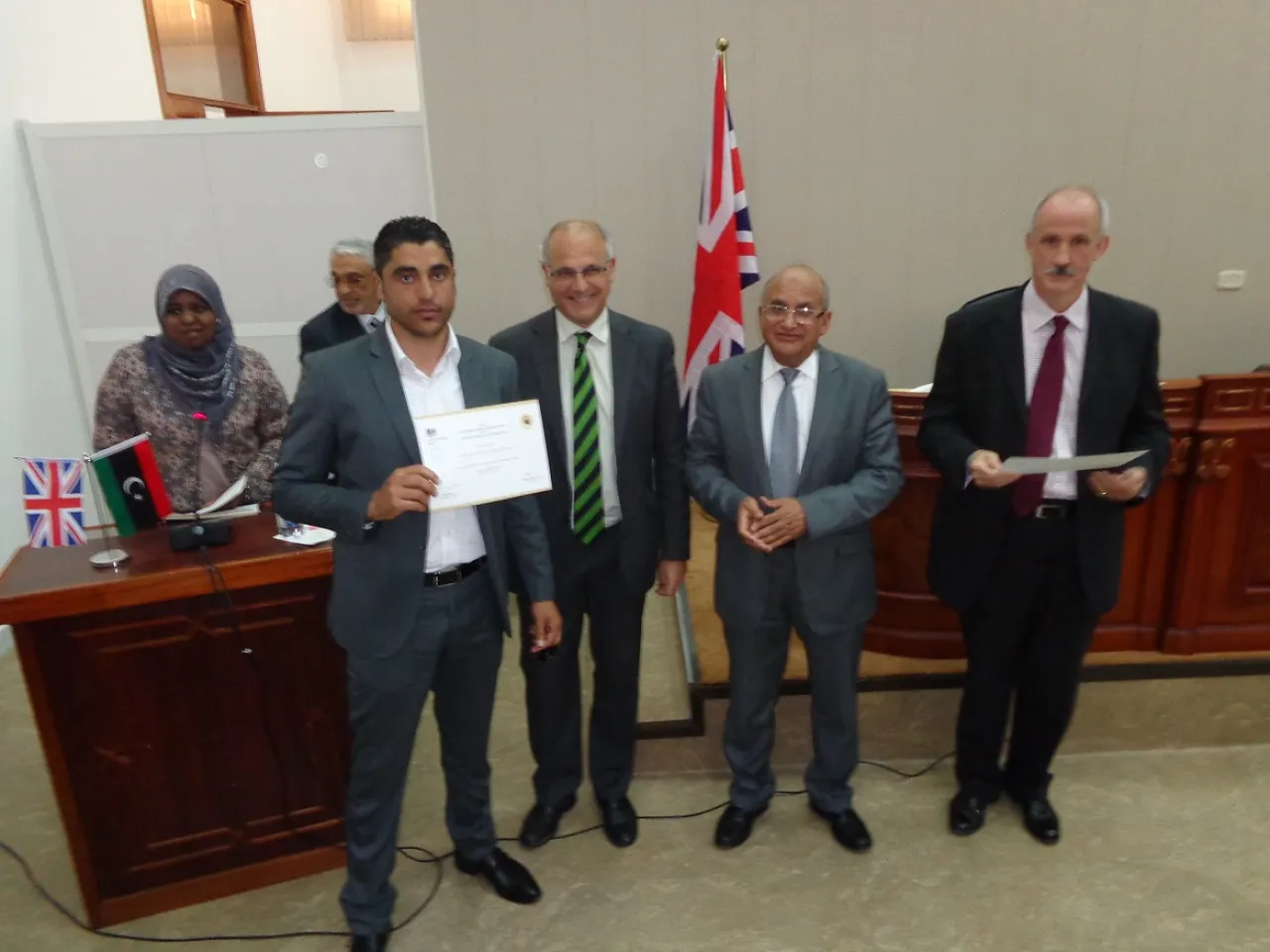 British ambassador Michael Aron, together with Tripoli University Chancellor Madani Dakheel and Deputy Commander Stuart Roberts handing out certificates at the ceremony held at the University of Tripoli Language Centre yesterday (Photo: Sami Zaptia).