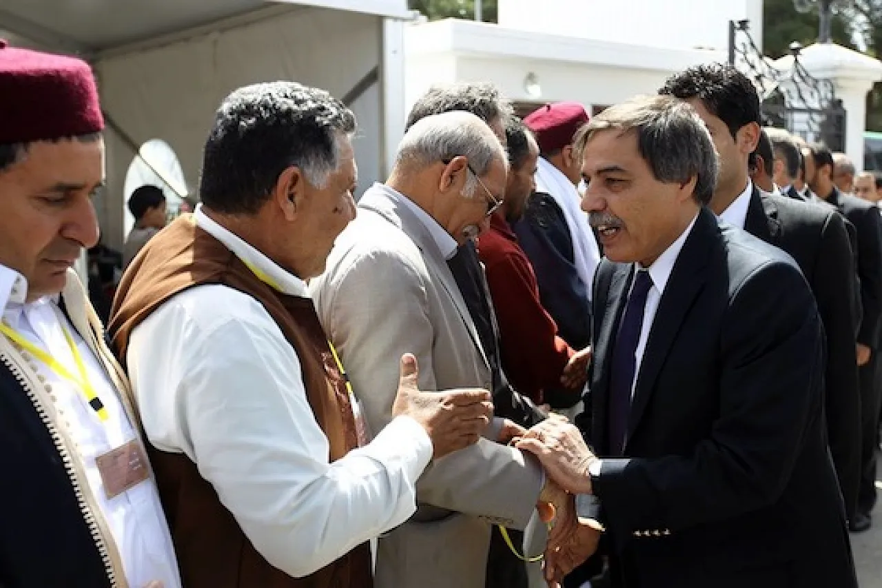 Local elders greet Ali Treiki and other Assembly members (Photo: Abdallah Doma)