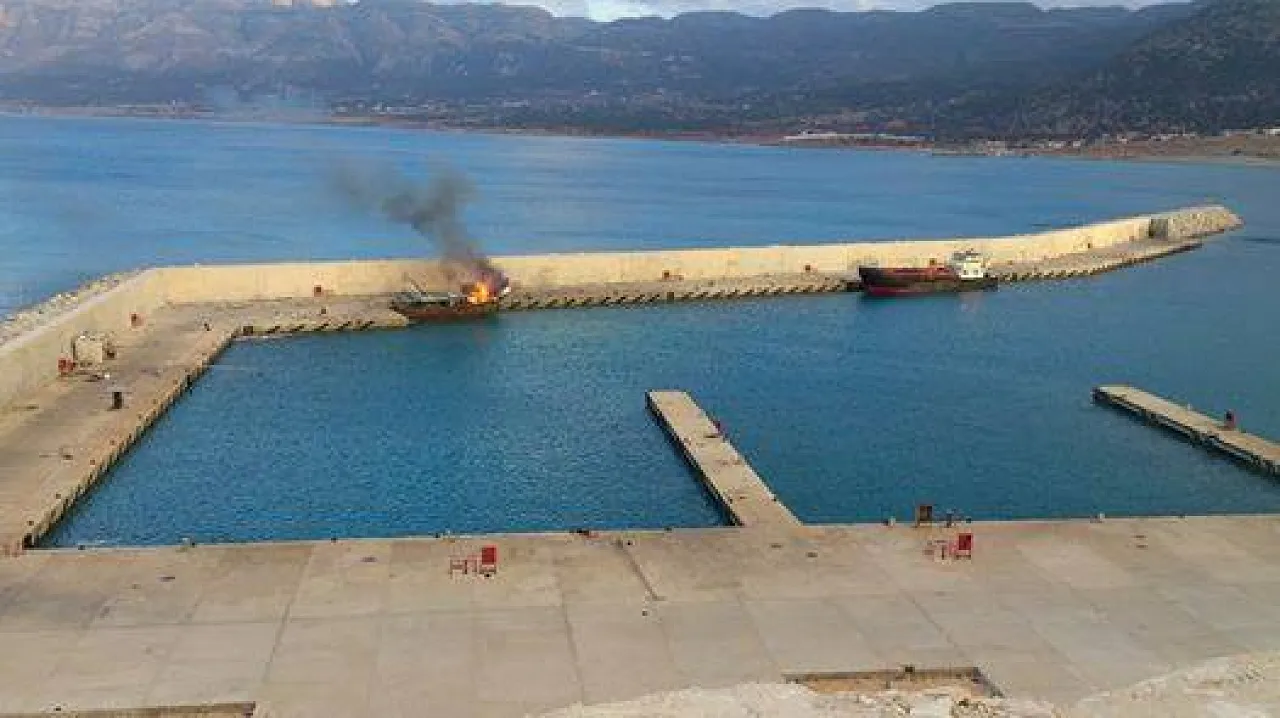 The burning trawlers pictured from the town (Photo:Facebook)