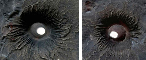 Almost identical volcanic cones in central al Haruj Al-Aswad. Typical radial drainage pattern signifies the uniformity of cone shape.  Sediments of fine sand and silt of fluvio-aeolean origin are in white in the centre of the cone.