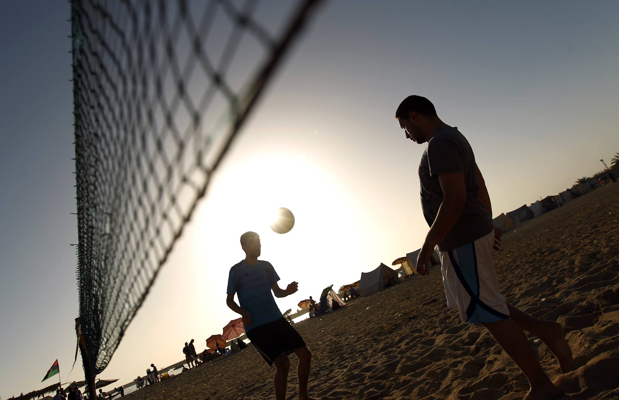 Benghazi residents make the most of the hot weather
