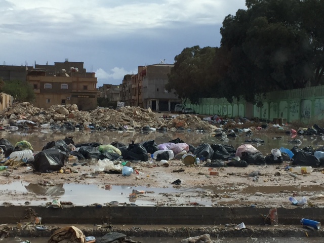 Light flooding in Benghazi causes havoc with mountains of waste