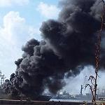 Navy ship on fire as clashes rage around Benghazi port