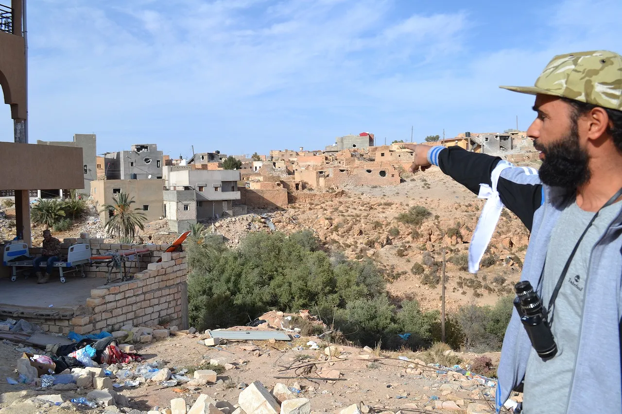  Pointing to Zintani snipers (Photo: Libya Herald reporter)
