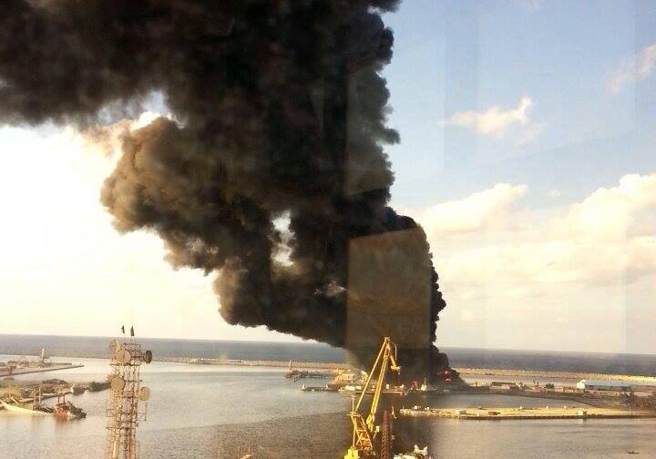 Ansar behead army captive as port blaze casts pall over Benghazi