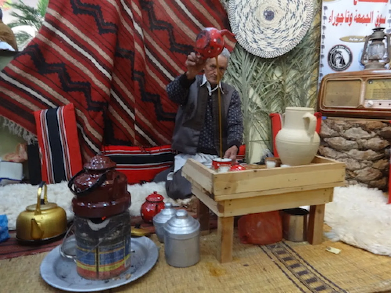 Traditional tea-making at the Souq Al-Juma and Tajoura stand
