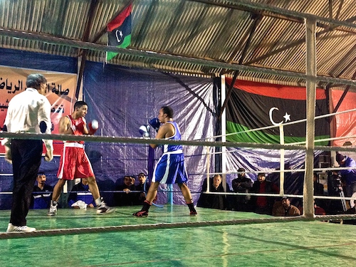 Two fighters square up to one another in the ring