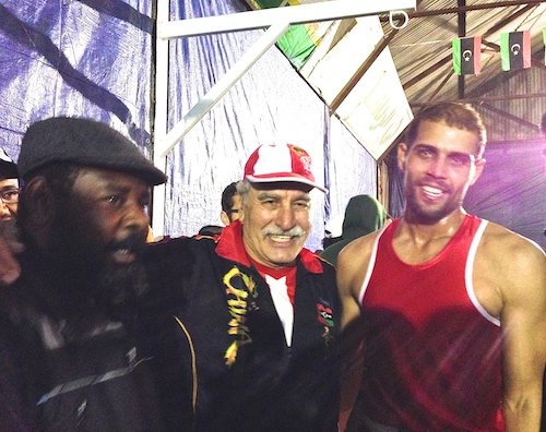 Ittihad coaches Sabri Al-Aswad and Mahmoud Boshkewa with fighter Osama Mohamed Maghboub