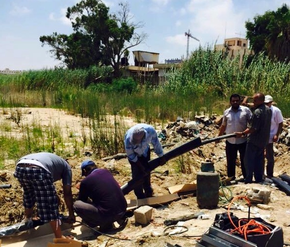 Benghazi GECOL engineers work on under risk of sniper fire