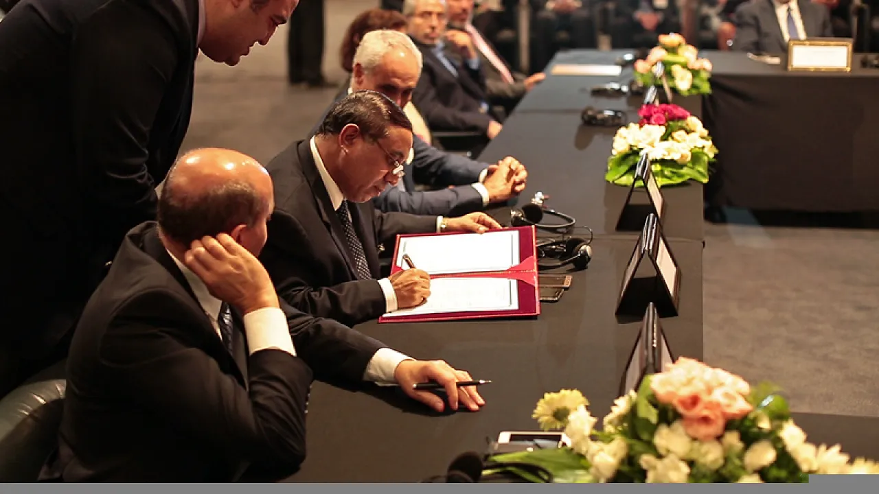 Sharf Al-Wafi signs  (Photo: UNSMIL)
