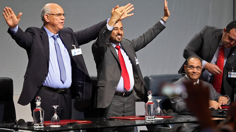 The moment of triumph as the deal is signed (Photo: UNSMIL)