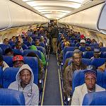 Despairing migrants flown home