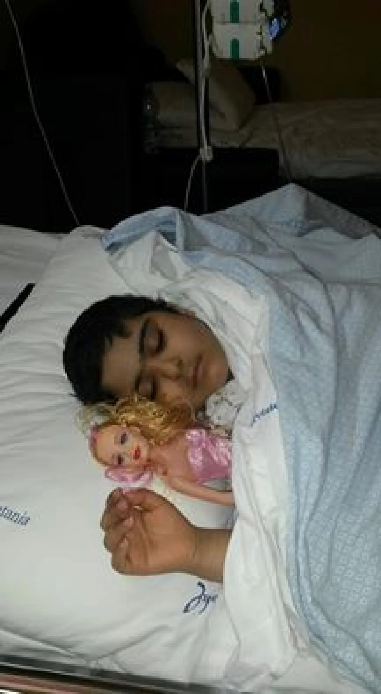 Sajida in her bed in Sicily 