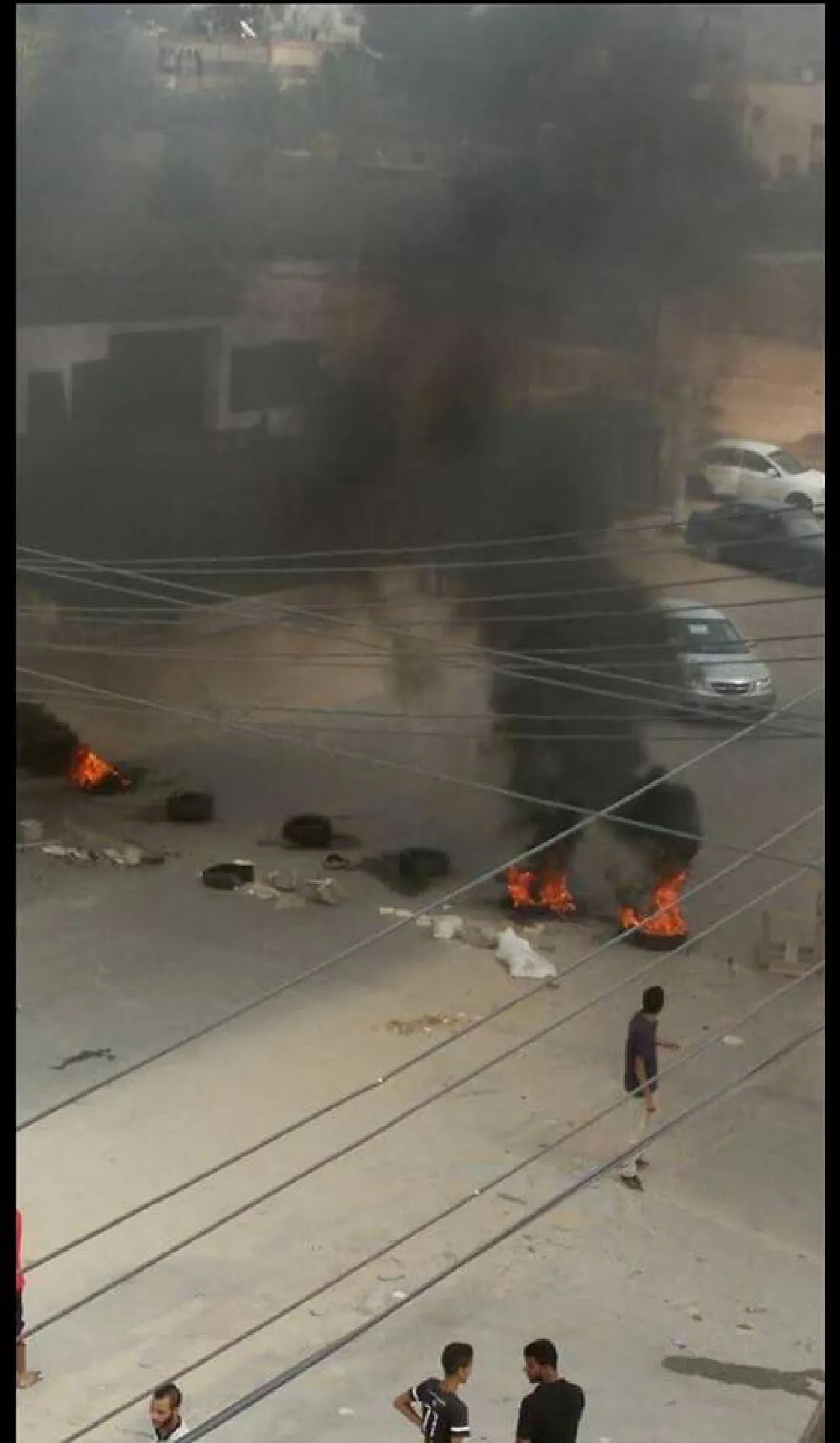 Youth burning tyres as part of demonstrations against extended power cuts (Photo: Social Media).