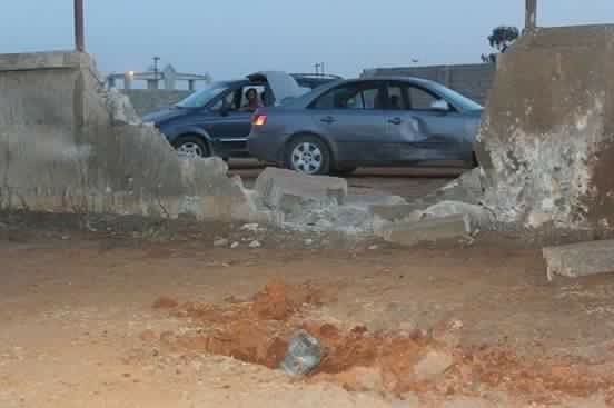 The rocket explosion blew down a wall and left a crater (Photo: social media)