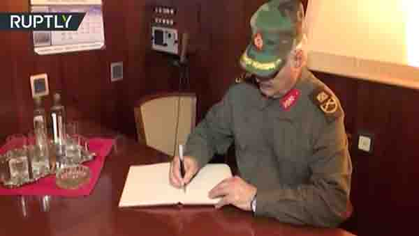 Khalifa Hafter signs a visitors book or an arms contract?