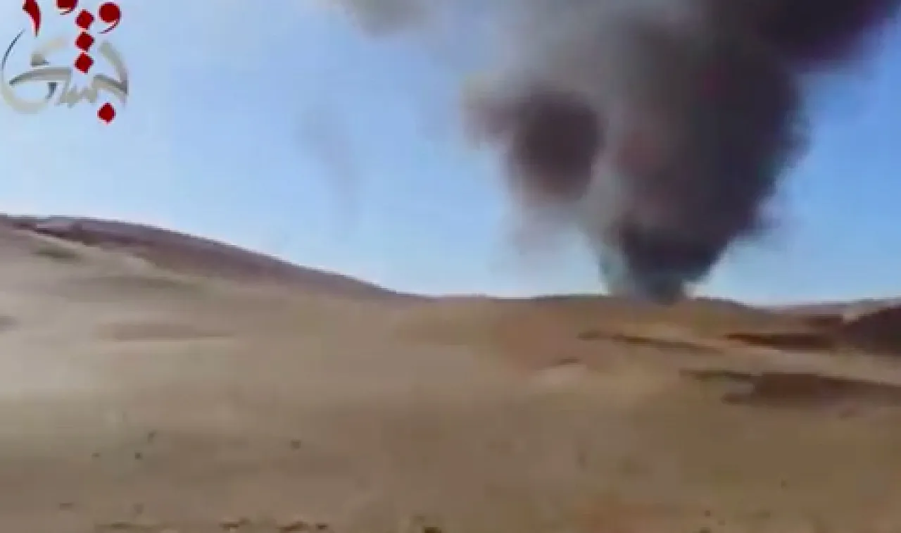 A screen grab showing the billowing smoke where the Mi-35 crashed