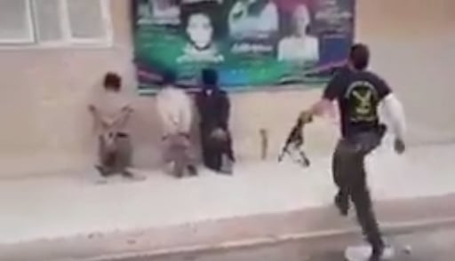 A man resembling Warfali just before he allegedly murdered three men in March 2017 (Screen grab)