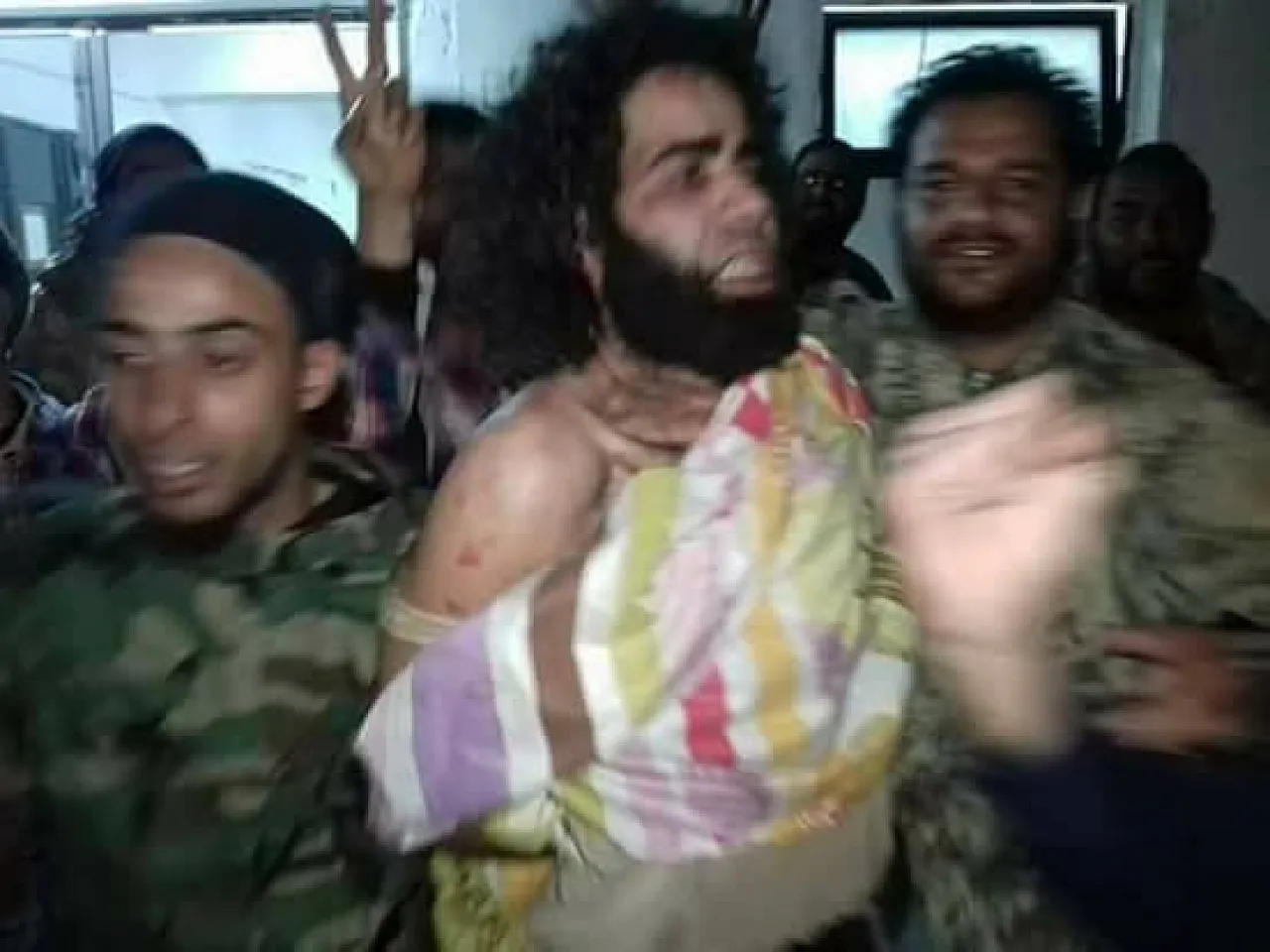 The captured Ibrahim Al-Zaroug before he was given an Ahli football shirt to wear (Photo: Social media)
