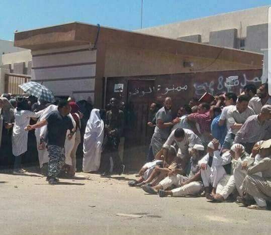 Eve of Eid tempers fray as bank queues lengthen