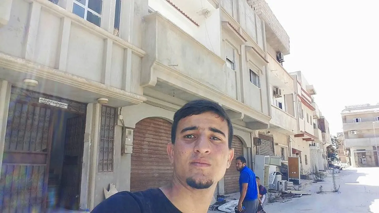 An anxious resident outside his Sabri home (Photo: social media)