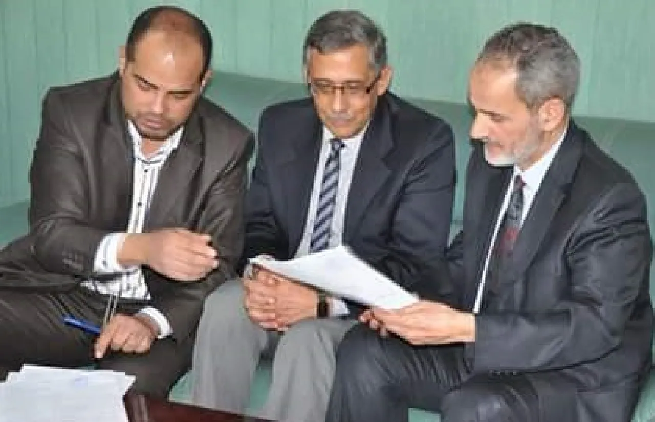 During a handover ceremony, Dr Nabil Alageli (centre) takes over as head of the TMC (Photo: TMC).