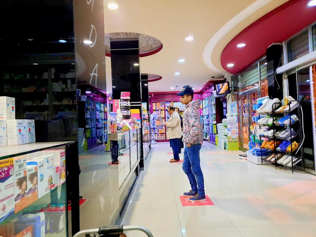 Customers in a pharmacy in Zliten implementing the Health Ministry's social distancing advice to mitigate the spread of Covid-19 (Photo: Tripoli Health Ministry).