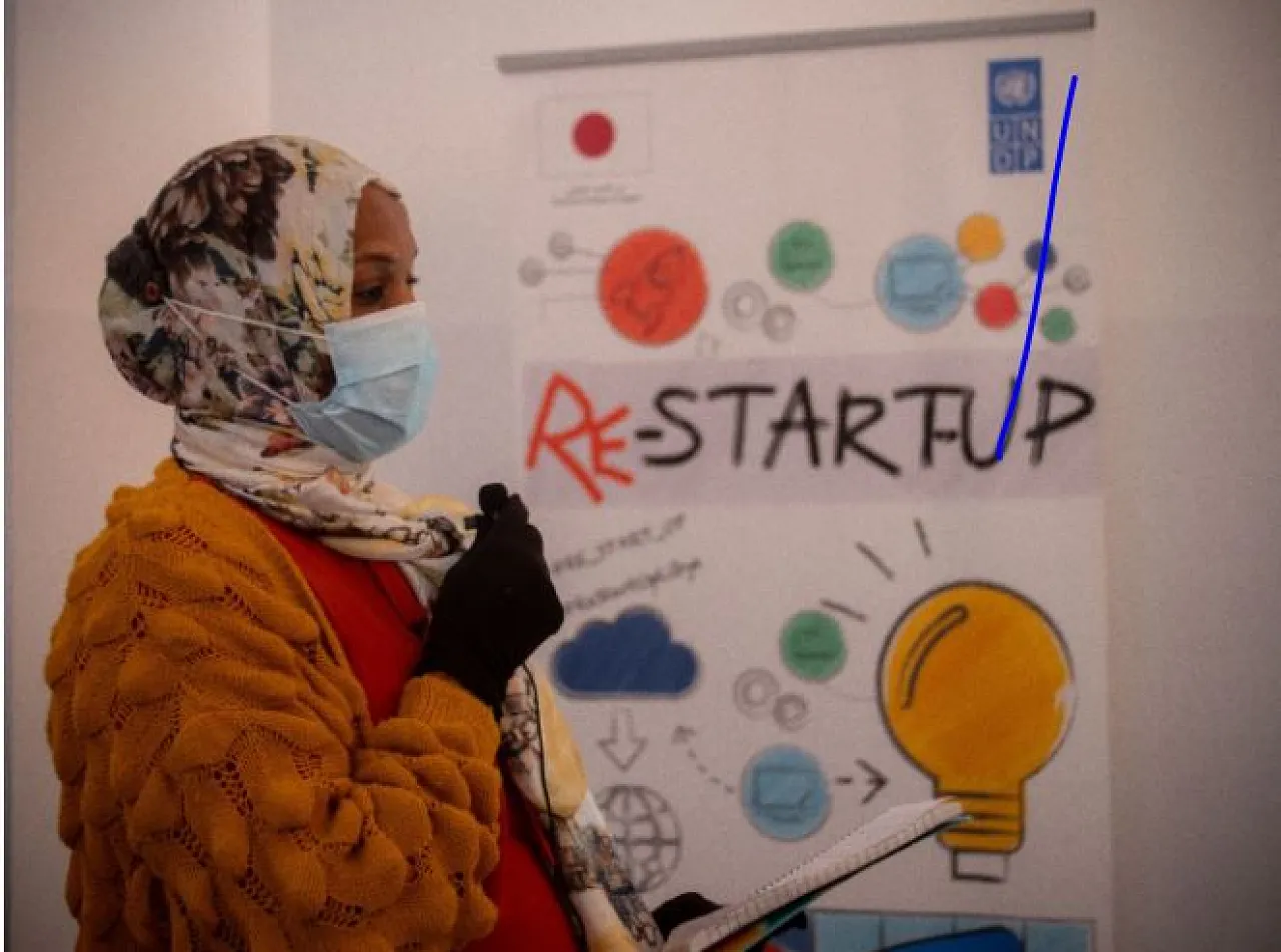 One of the entrepreneurs from Tawergha presents her business idea during the Re-Start-Up Marathon (Photo: UNDP Libya/Malek Elmaghrebi)